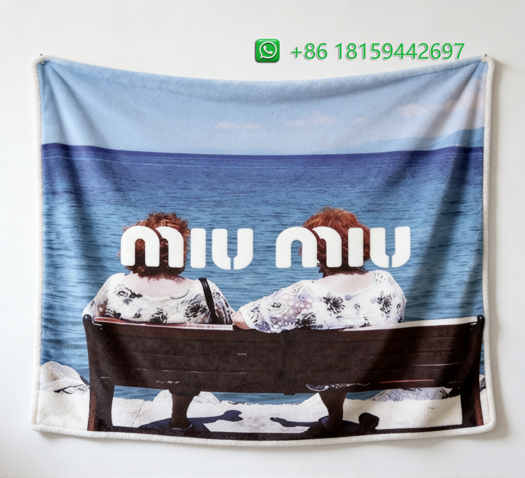 Miumiu Throw Blankets